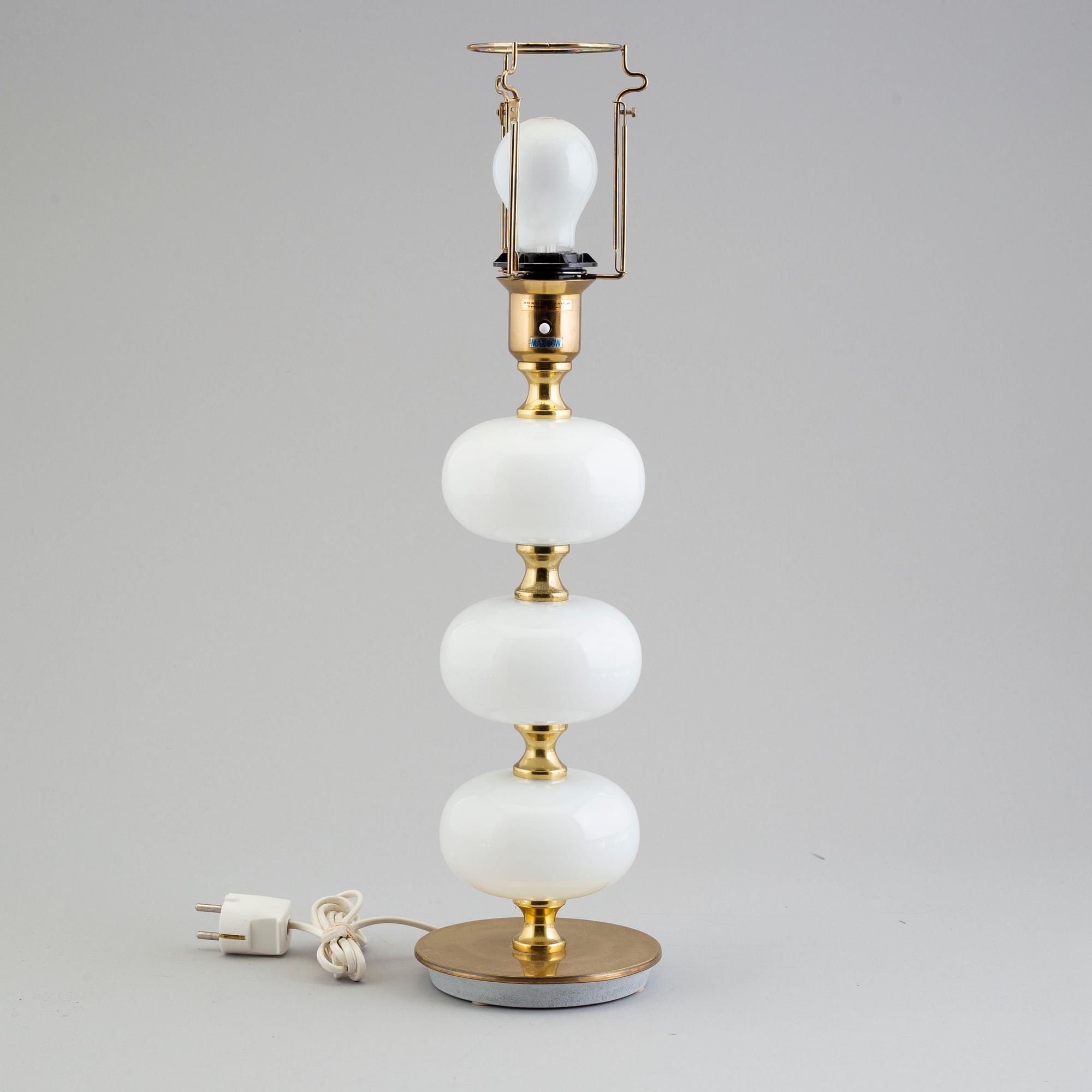 A glass and metal table light from Stilarmatur, Tranås, 1960's/70's.