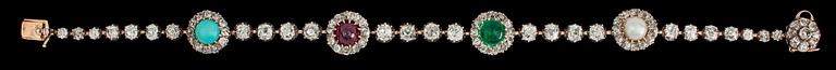 ARMBAND, antikslipade diamanter, tot. ca 5.70 ct, rubin, ca 1.13 ct samt smaragd ca 1.30.