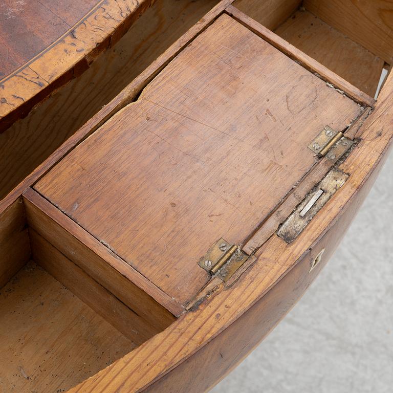 An Empire sewing table, mid-19th Century.