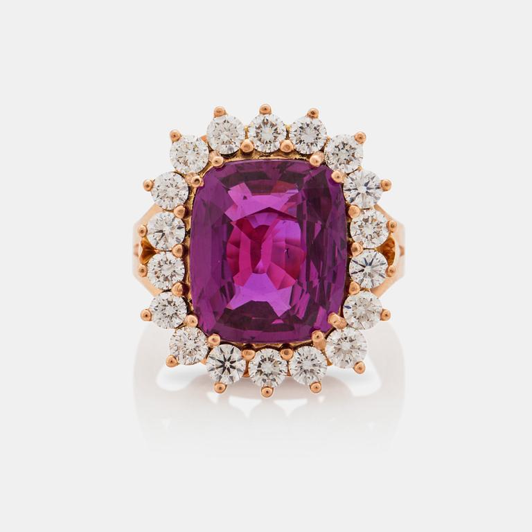 An unheated 9.55 ct fancy pink sapphire and brilliant-cut diamond ring. Certificate from Gübelin.