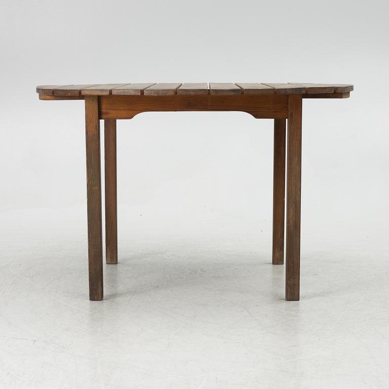 Carl Malmsten, garden furniture, a table and two armchairs. "Bergshamra", second half of the 20th century.
