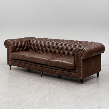 A modern chesterfield sofa.