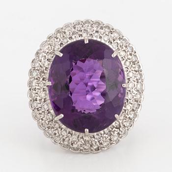 RING, 18K white gold with a large amethyst and small diamonds ca 0.65 cts.