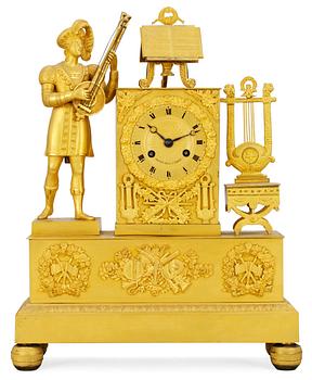 1078. A French late Empire mantel clock by Gaston Jolly.