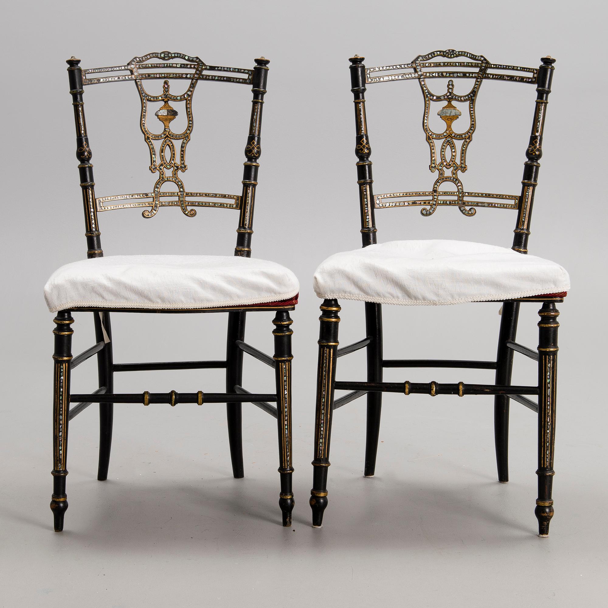 A pair of late 19th century Chinese chairs.
