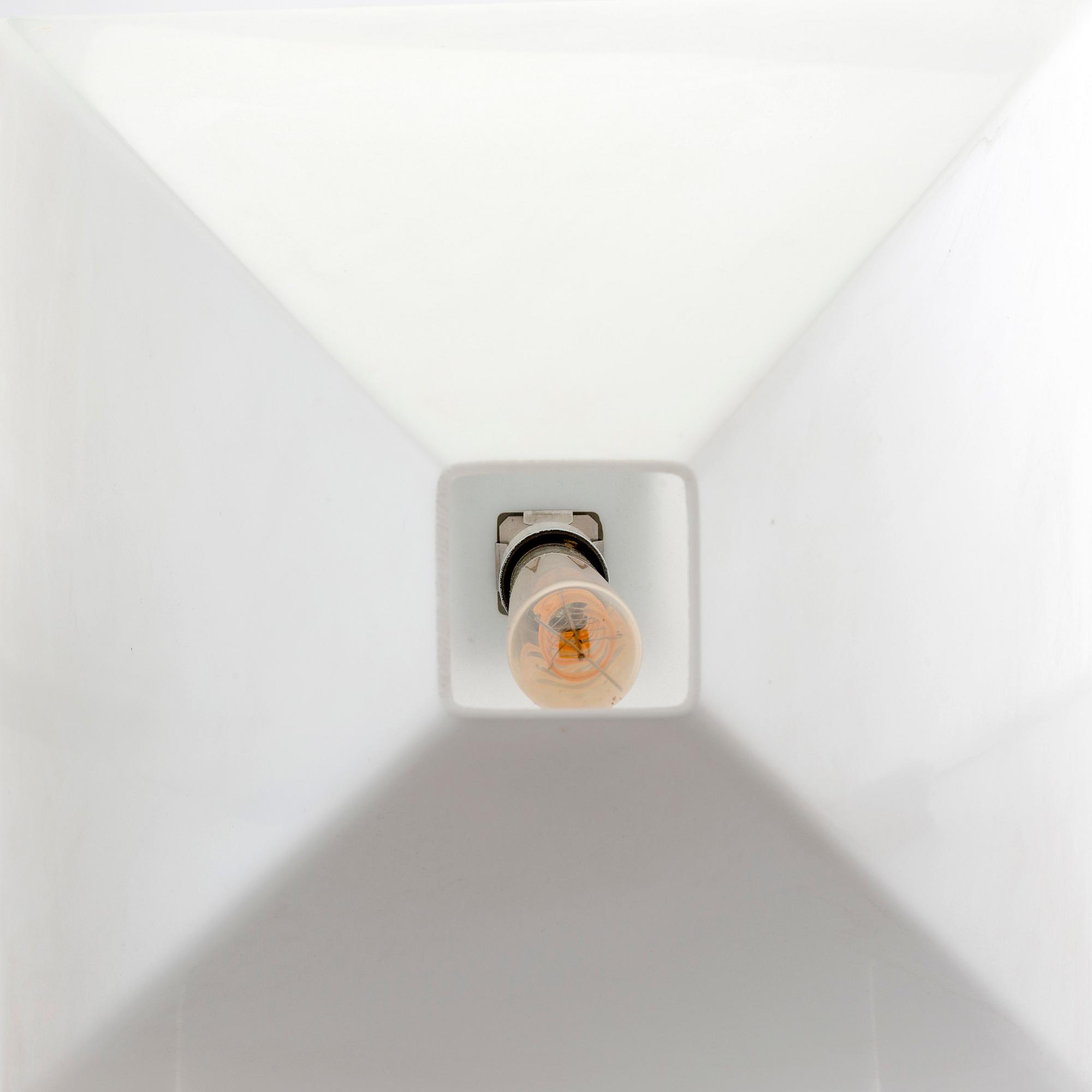 A Giorgio Armani, Logo table lamp for Armani Casa 1982.