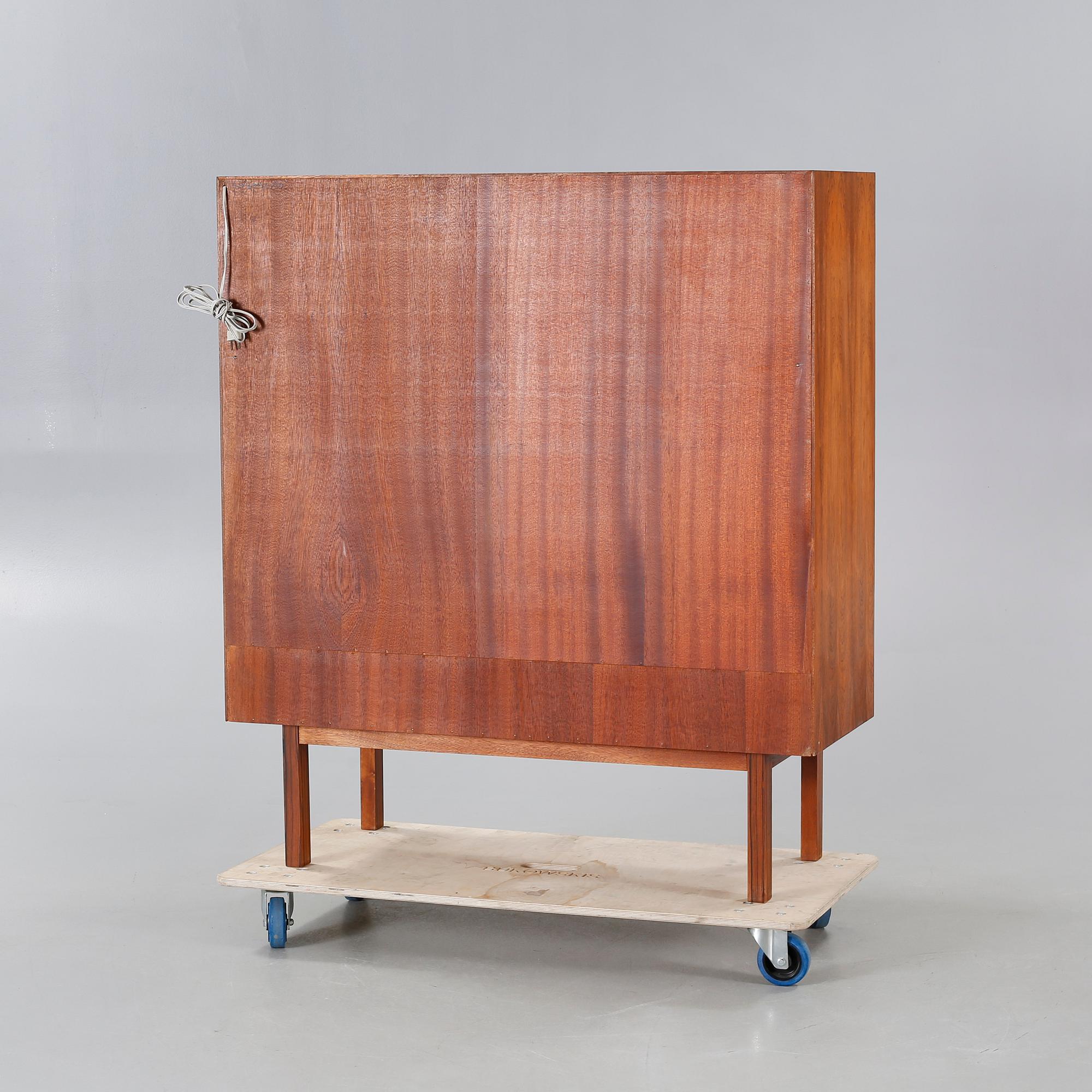A 1960s drinks cabinet by Axel Christensen, Odder Möbelfabrik, Denmark.