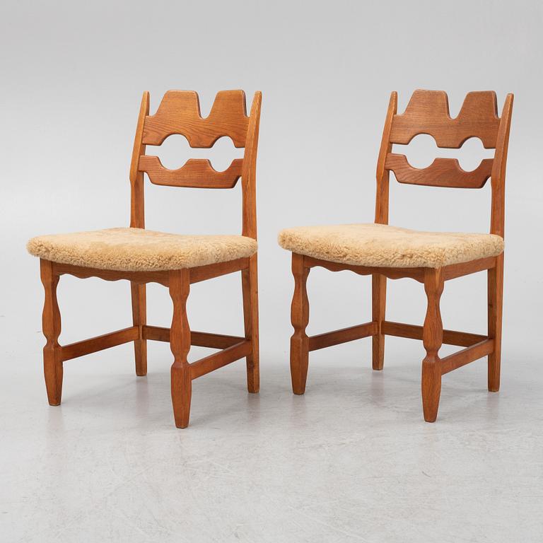 Henning Kjærnulf, a set of six oak 'Razorblade' chairs with new sheepskin upholstery, Nyrups, Denmark, 1960s.