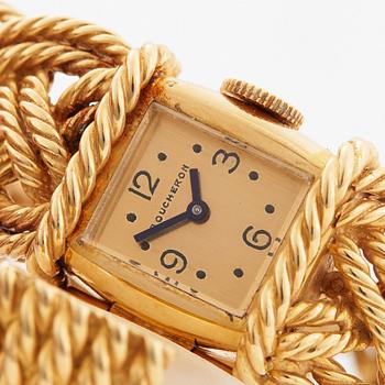 A Boucheron 18K gold wristwatch.