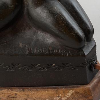 Halvar Frisendahl, a bronze table lamp, signed and dated 1919.