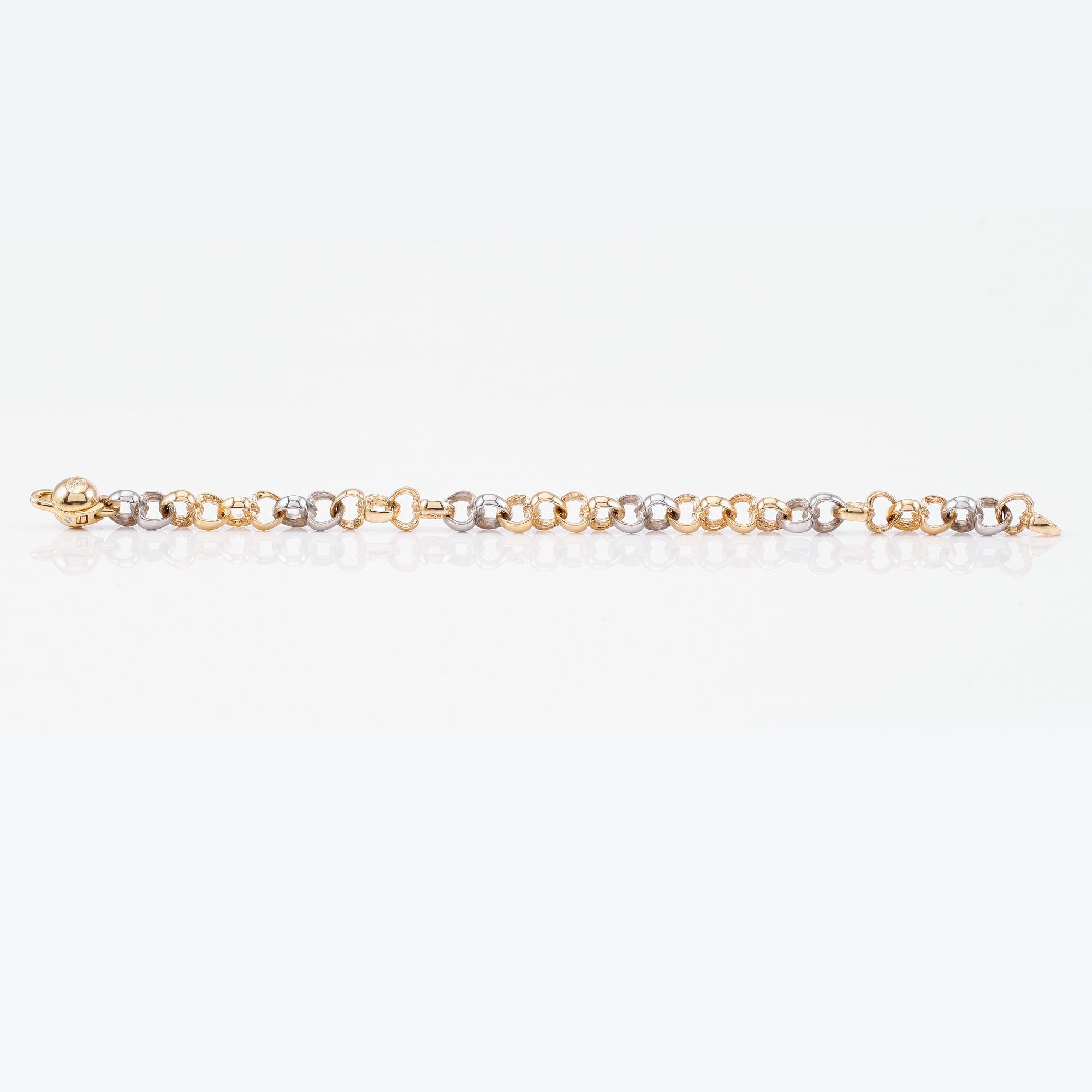 ARMBAND, 18K guld/vitguld samt mindre diamant, Per Borup. Total vikt ca 29 g.
