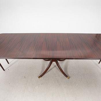 AN English mahogany dining table later part of the 20th century.
