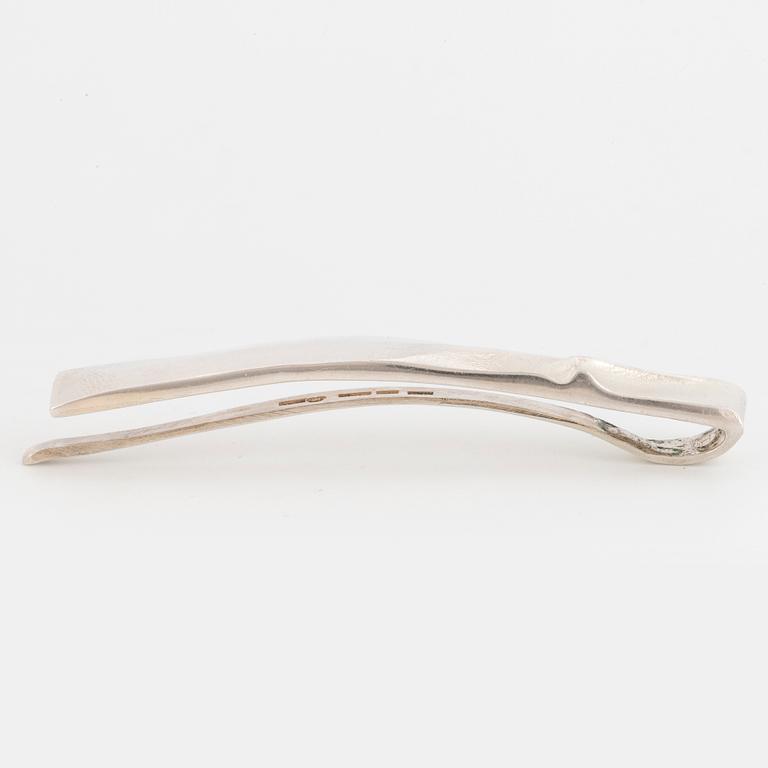 Earrings, silver, "Mini Punk" 1990, and tie clip, Björn Weckström, Lapponia.