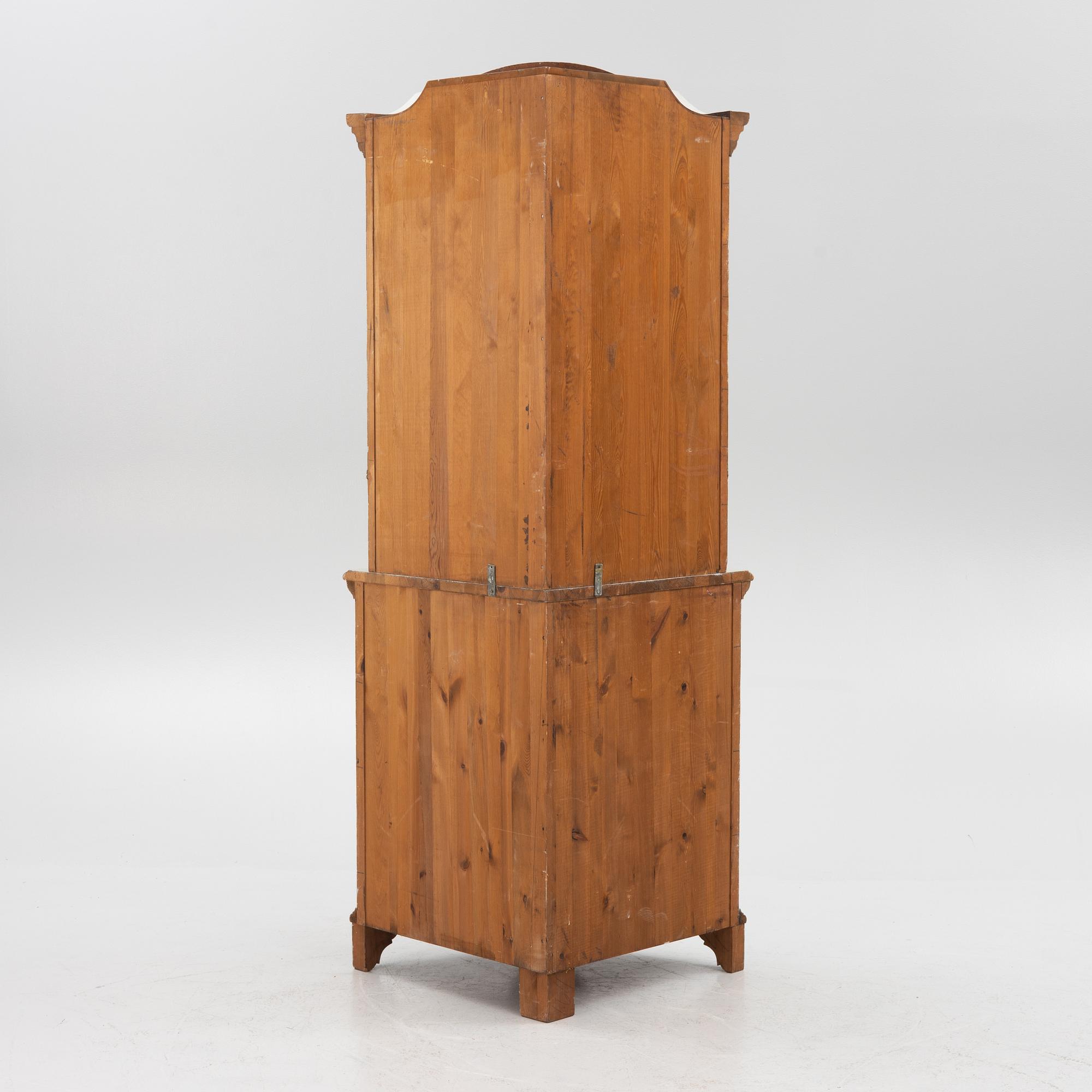 A Gustavian style 20th century corner cabinet.