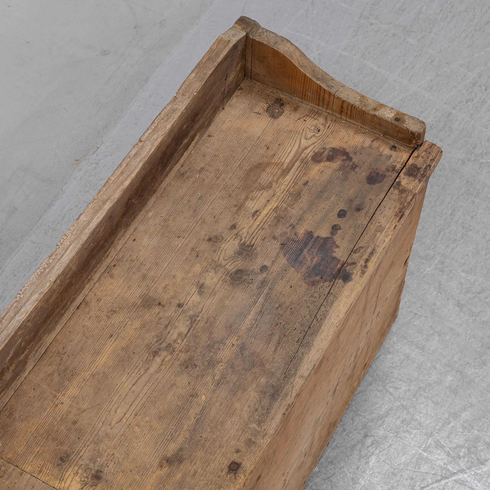 A provincial Swedish wooden sofa, later part of the 19th Century.