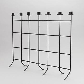 An iron candlestick, second half of the 20th Century.