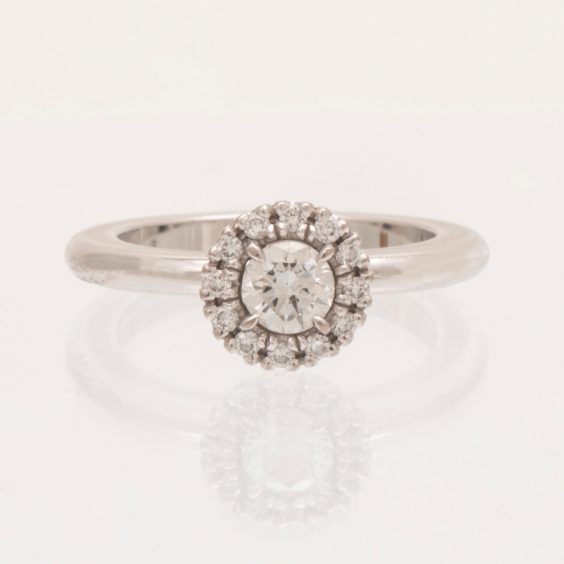 An 18K white gold ring with round brilliant cut diamonds by Engelbert, with GIA dossier.