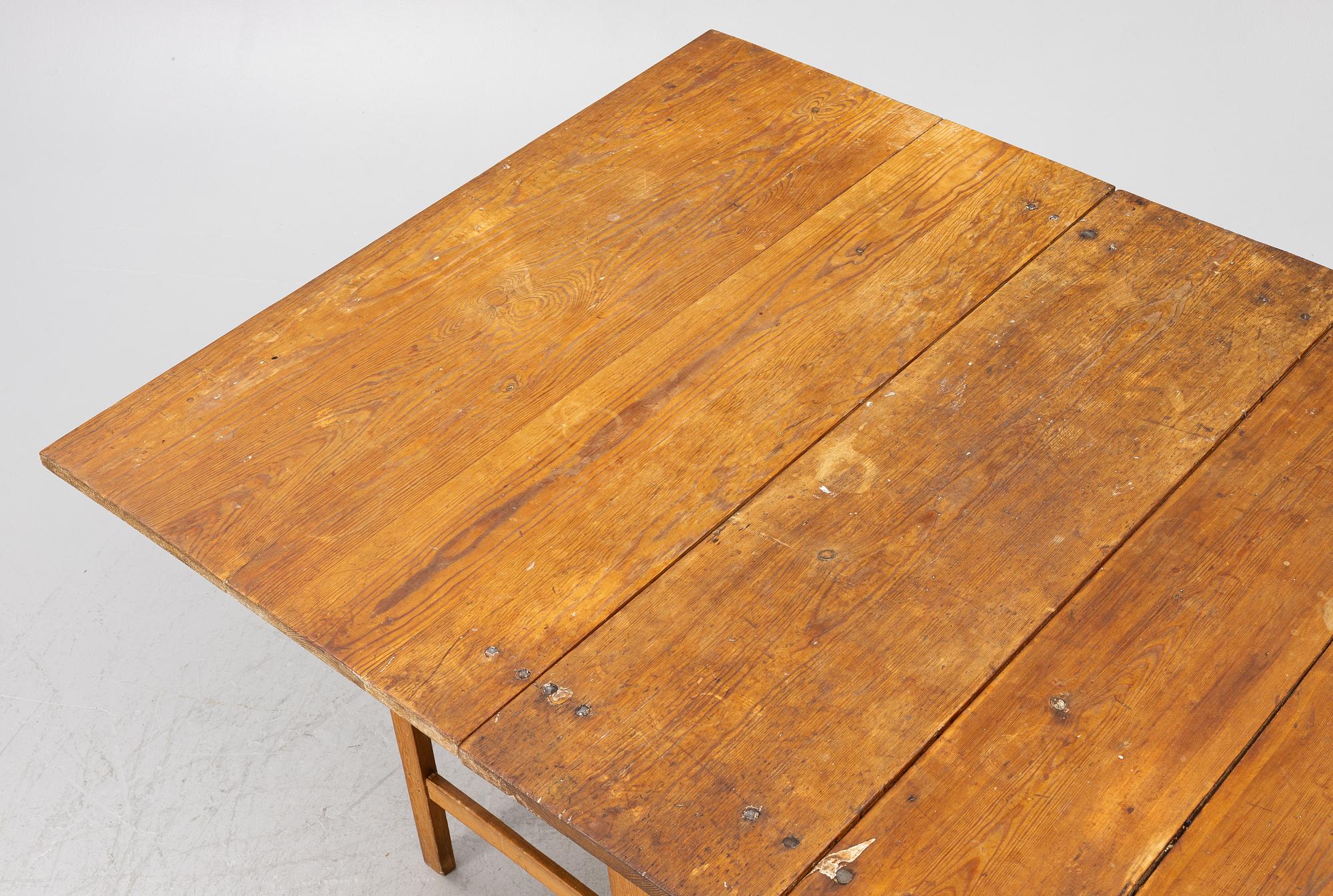 A drop-leaf table, 19th Century.