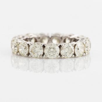 Brilliant cut diamond eternity ring.