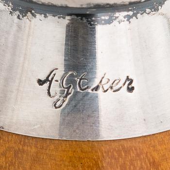 Anna-Greta Eker, A mahogany and silver sugar bowl and cream jug and a silver bowl, Auran Kultaseppä, Turku 1963-67.