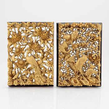 Two carved gilded wooden panels, Qing dynasty, circa 1900.