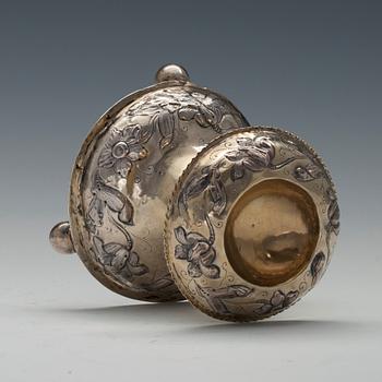 A SALT CELLAR, silver. Holland 18th century. Parcelgilt with chased decorations. Height 10 cm. Weight 100 g.