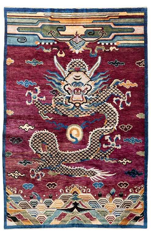 A Chinese silk and metal-thread 'Dragon' pillar rug, Bejing, North China, around 1910, c. 234x151 cm.