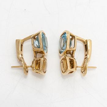 Cassandra Goad, a pair of 18K gold earrings with topazes and citrines. London.