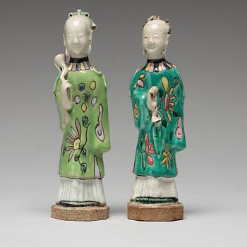 A group of eight famille rose figurines, Qing dynasty, 19th Century.