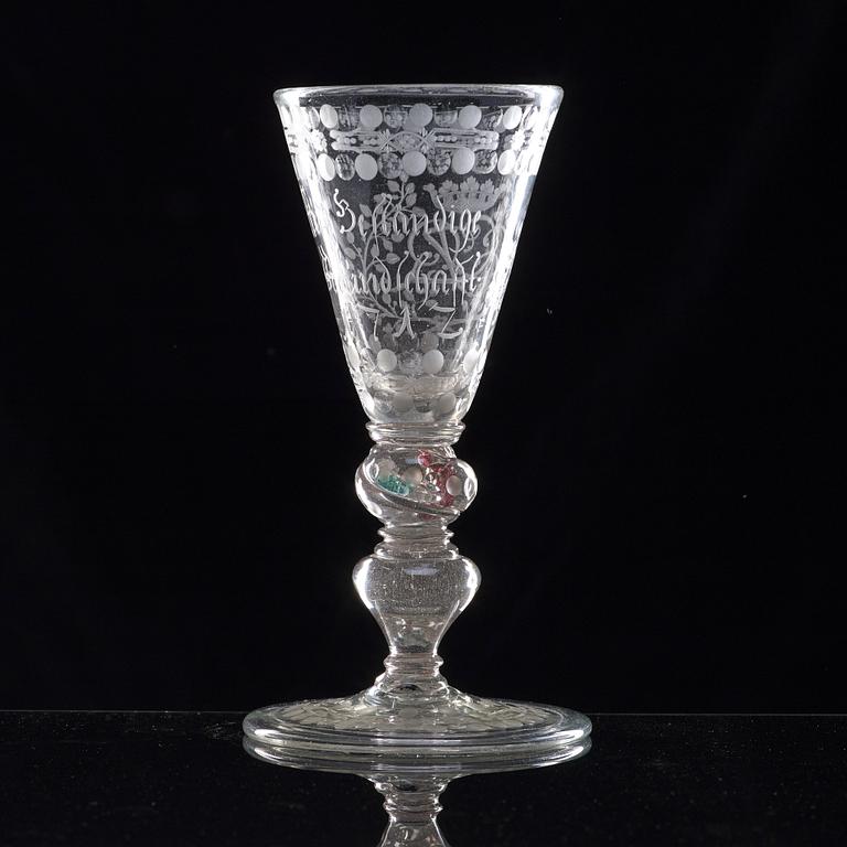 A German cut and engraved glass goblet, 18th Century.