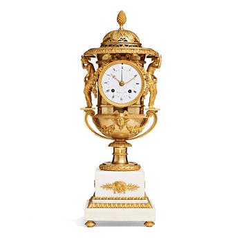 135. A French early 19th century mantel clock.