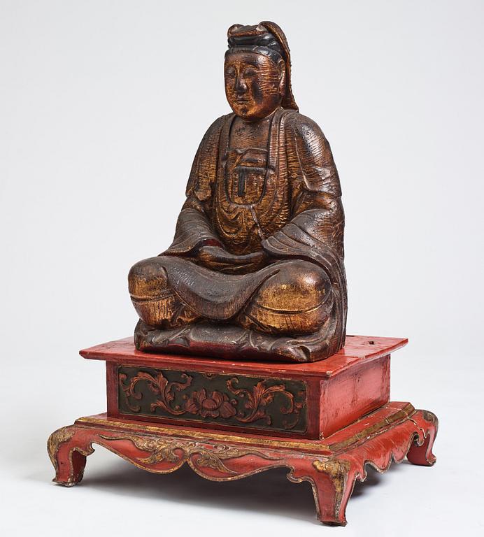 A large wooden gilt lacquer figure of Guanyin, Vietnamese/Southern China, about 1800 or later.