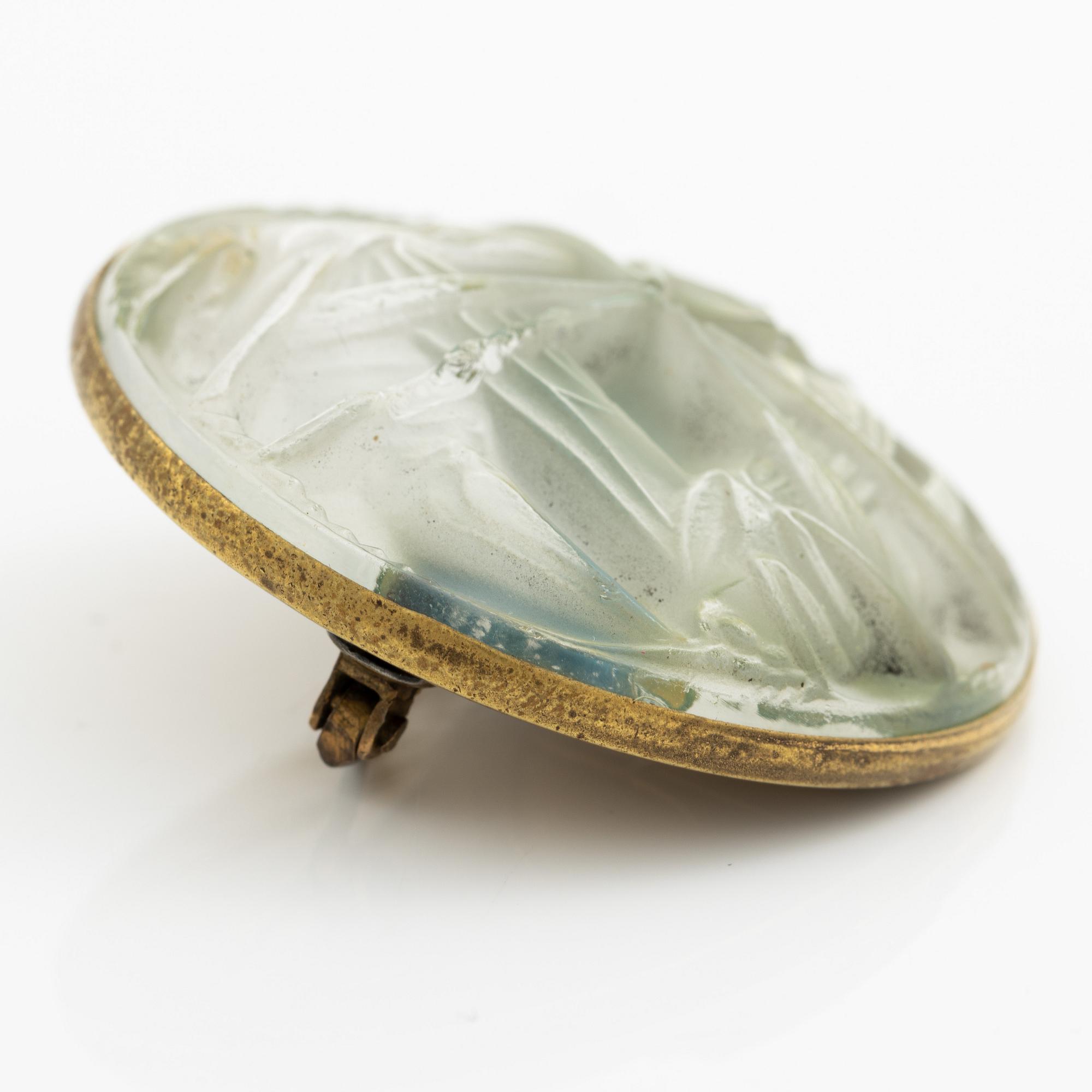 René Lalique, a brooch, glass, with a motif of crickets.