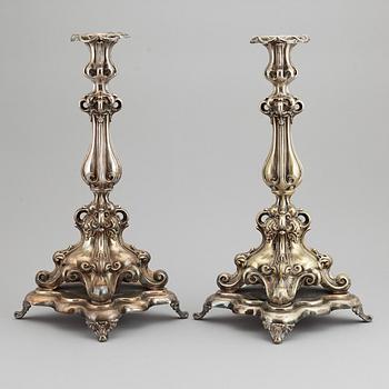 A pair of barocque style nine lights candelabra, silver plate, 20th Century.