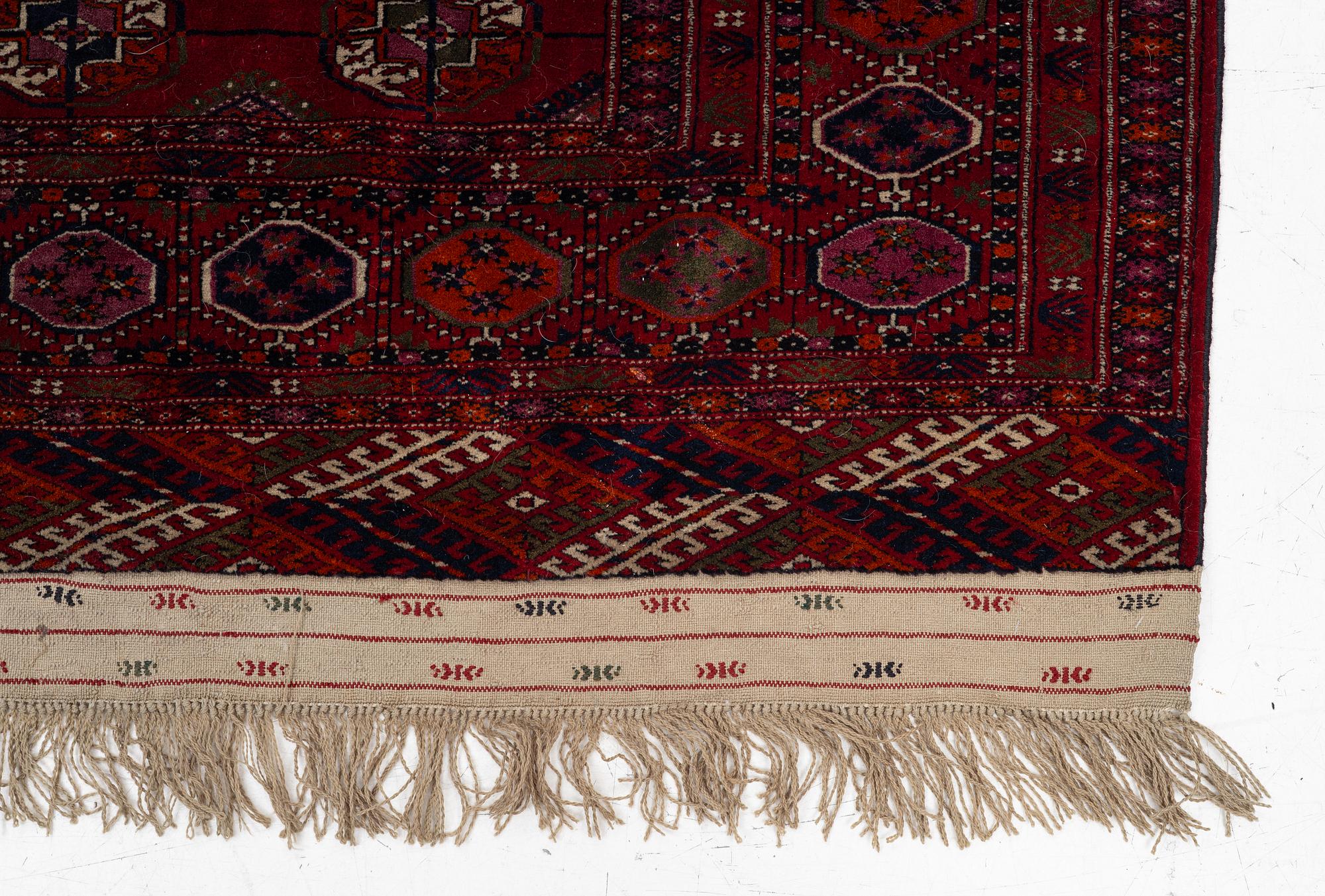 An old Turkmen carpet, c. 235 x 175 cm.