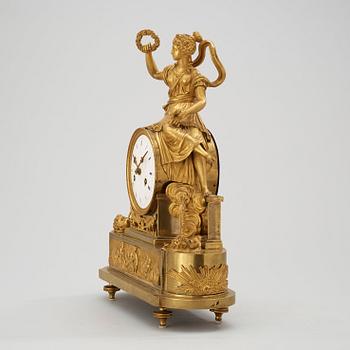 A French Empire early 19th century gilt bronze mantel clock.