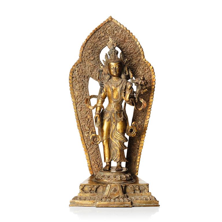 A gilt copper-alloy figure of Boddhisatva Avalokiteshvara, Nepal, 20th century.