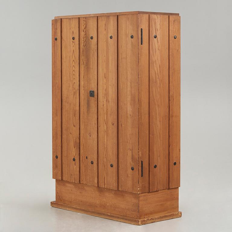 An Axel Einar Hjorth 'Lovö' stained pine cabinet, Nordiska Kompaniet, Sweden 1930's.