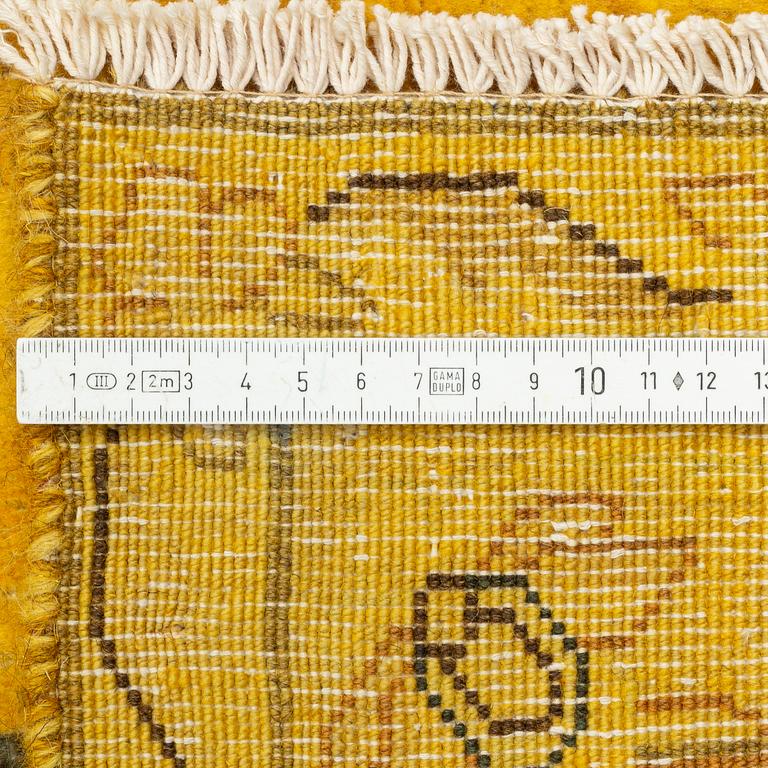A Kirman carpet of 'vintage' design, c 382 x 293 cm.
