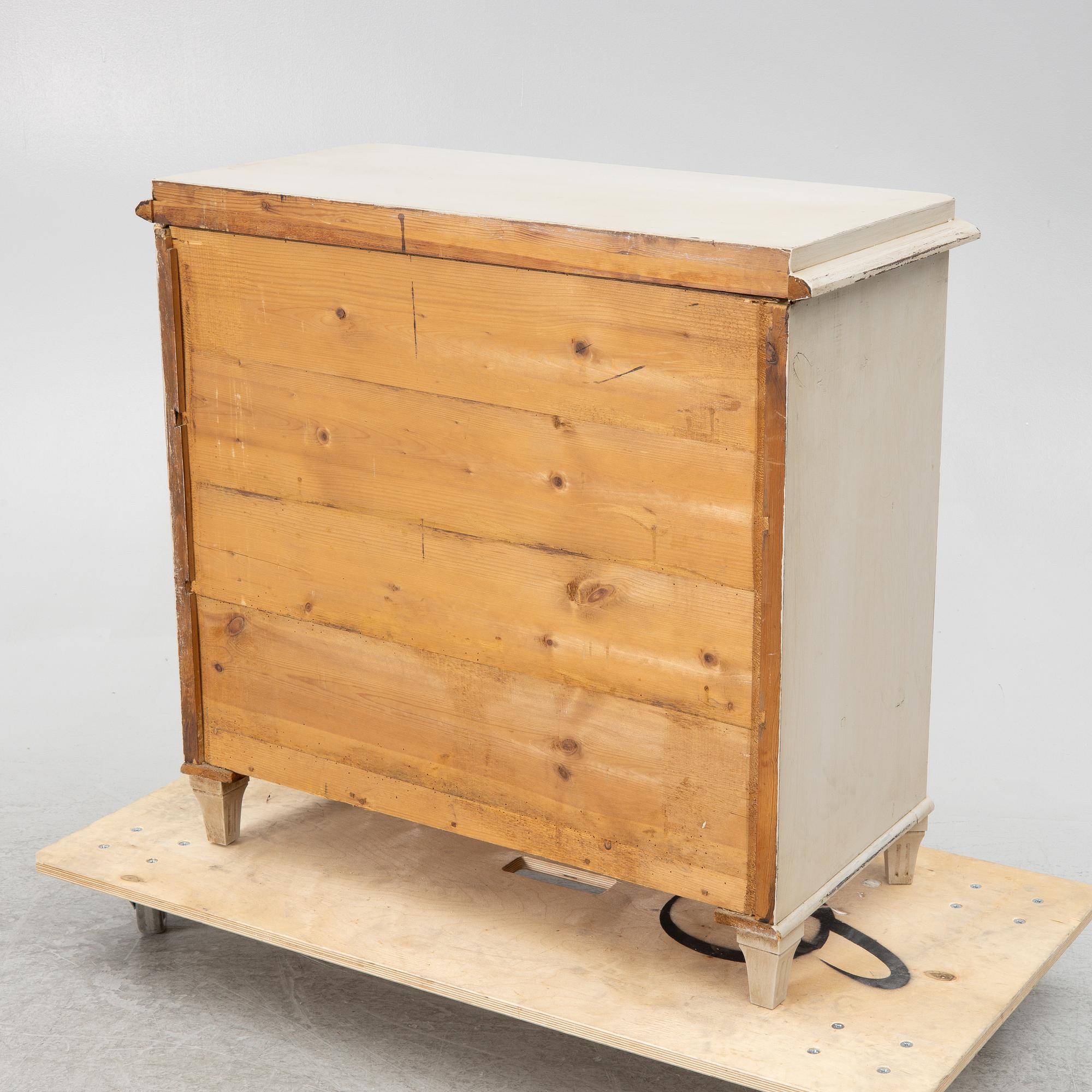 A chest of drawers, around 1900.