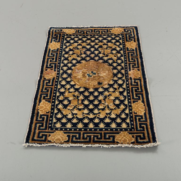 A semiantique Chinese Ningxia carpet ca 94 x 58 cm.