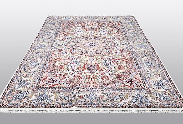 A carpet, Old Esfahan, part silk, ca 308 x 202 cm.