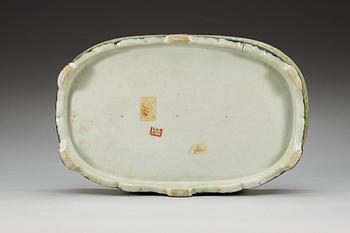 A celadon glazed narcissus jardiniere, Qing dynasty.