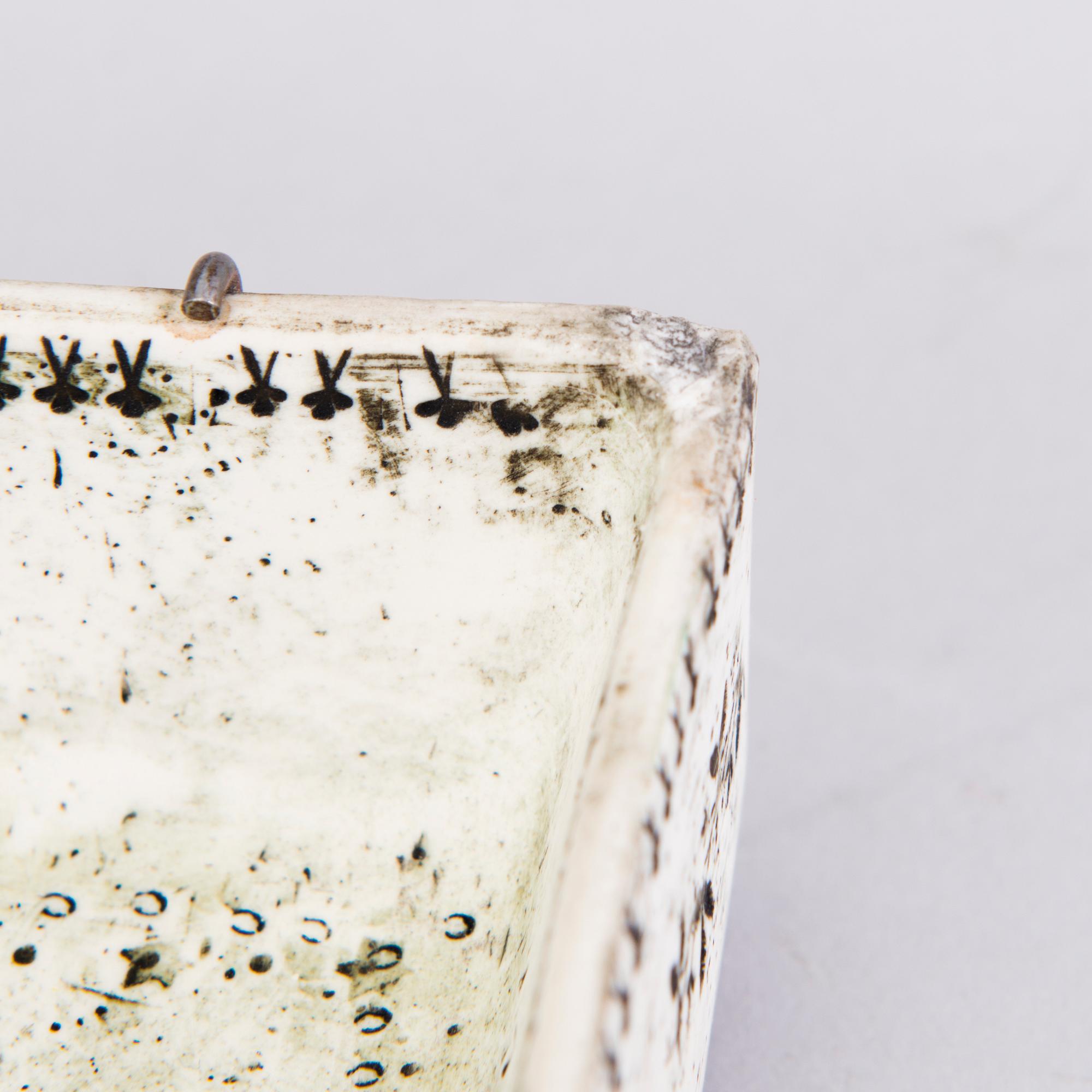 RUT BRYK, A stoneware relief signed a tergo Bryk.