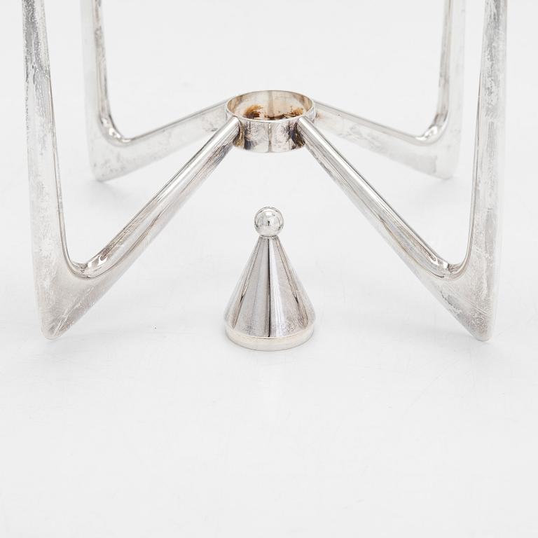 A four-candle silver candelabrum, maker's mark of Anna-Greta Eker, Auran Kultaseppä, Turku 1965.