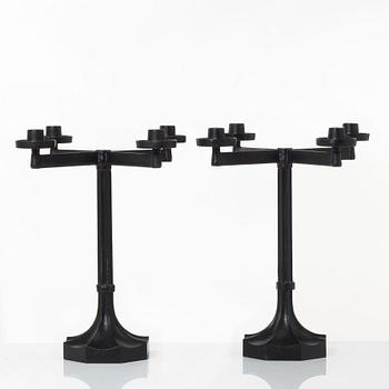 Sigurd Persson, a pair ofa cast iron candelabras, Kockums 1965.