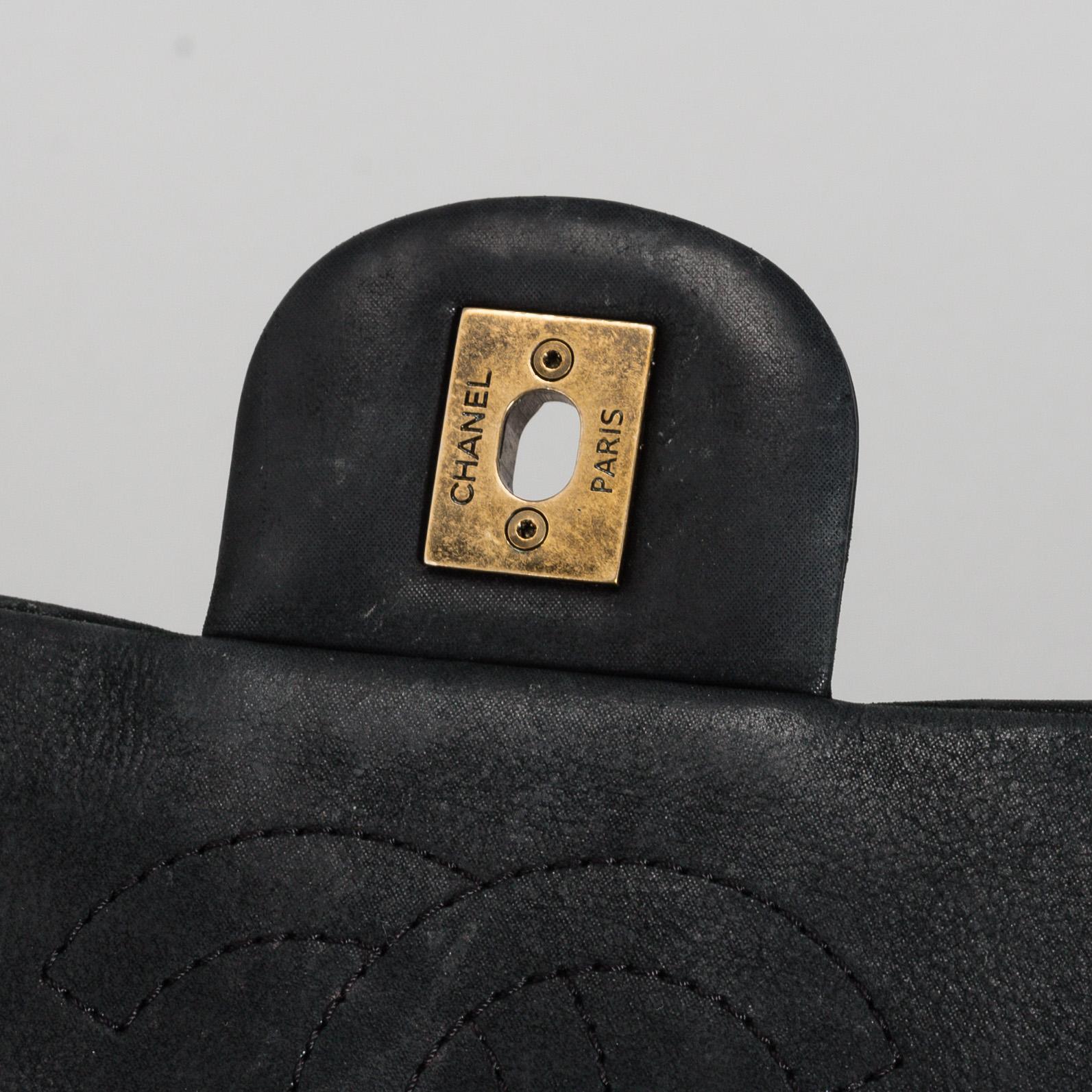 CHANEL, a black quilted fabric 'Flap Bag', 2015-2016.