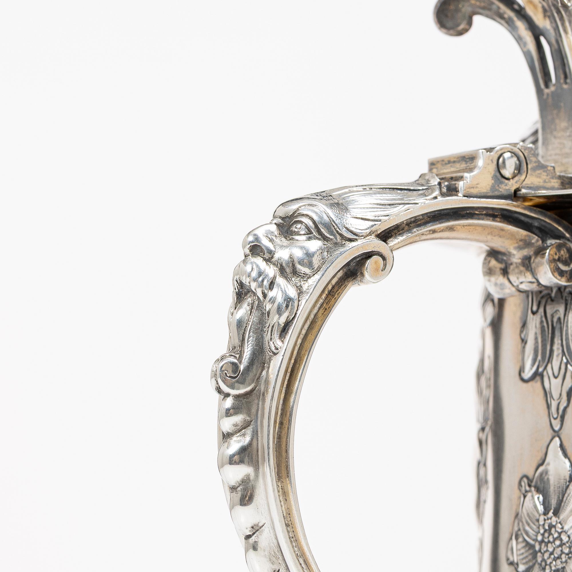 C.G. Hallberg, Dryckeskanna, silver, Stockholm 1903.