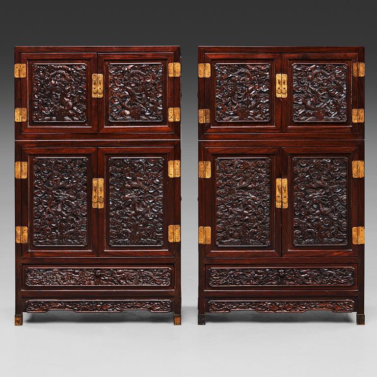 A pair of Chinese hardwood cupboards, late Qing dynasty (1644-1912).