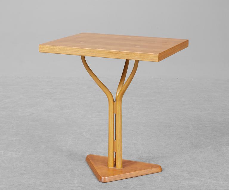 A Carl- Axel Acking oregon pine table by Nordiska Kompaniet for the Hotel Malmen ca 1949-51.